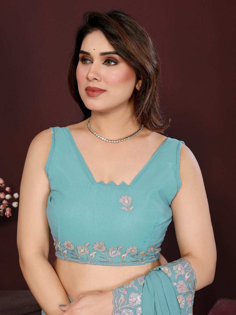 Stunning Turquoise Georgette Embroidery Work Saree with Matching Embroidered Blouse