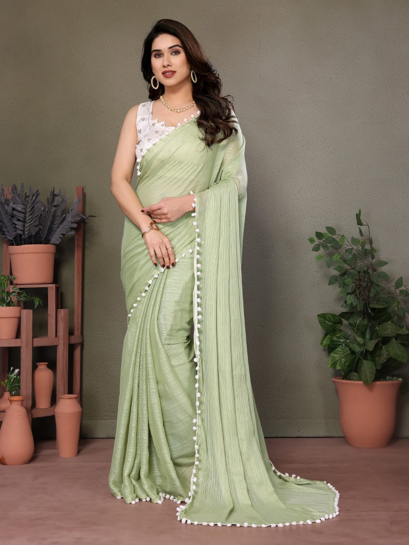 Refreshing Pista Green Polyester Zari Saree with Embroidered Blouse & Pum Pum Lace