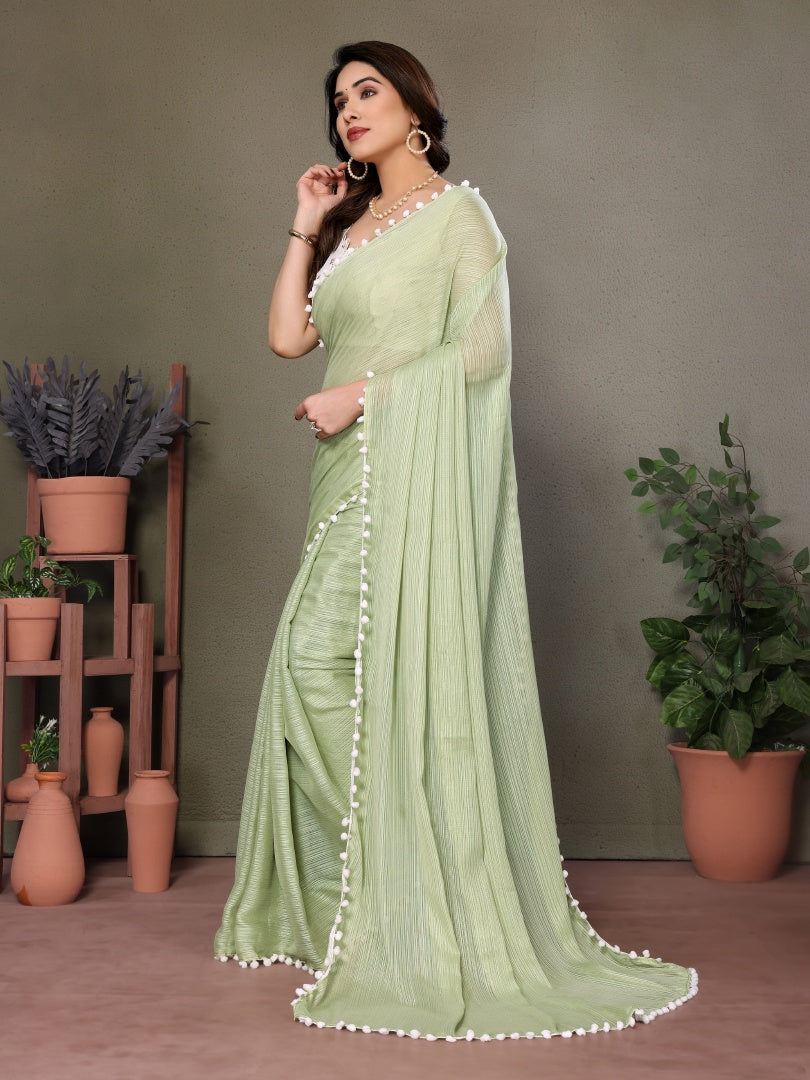 Refreshing Pista Green Polyester Zari Saree with Embroidered Blouse & Pum Pum Lace